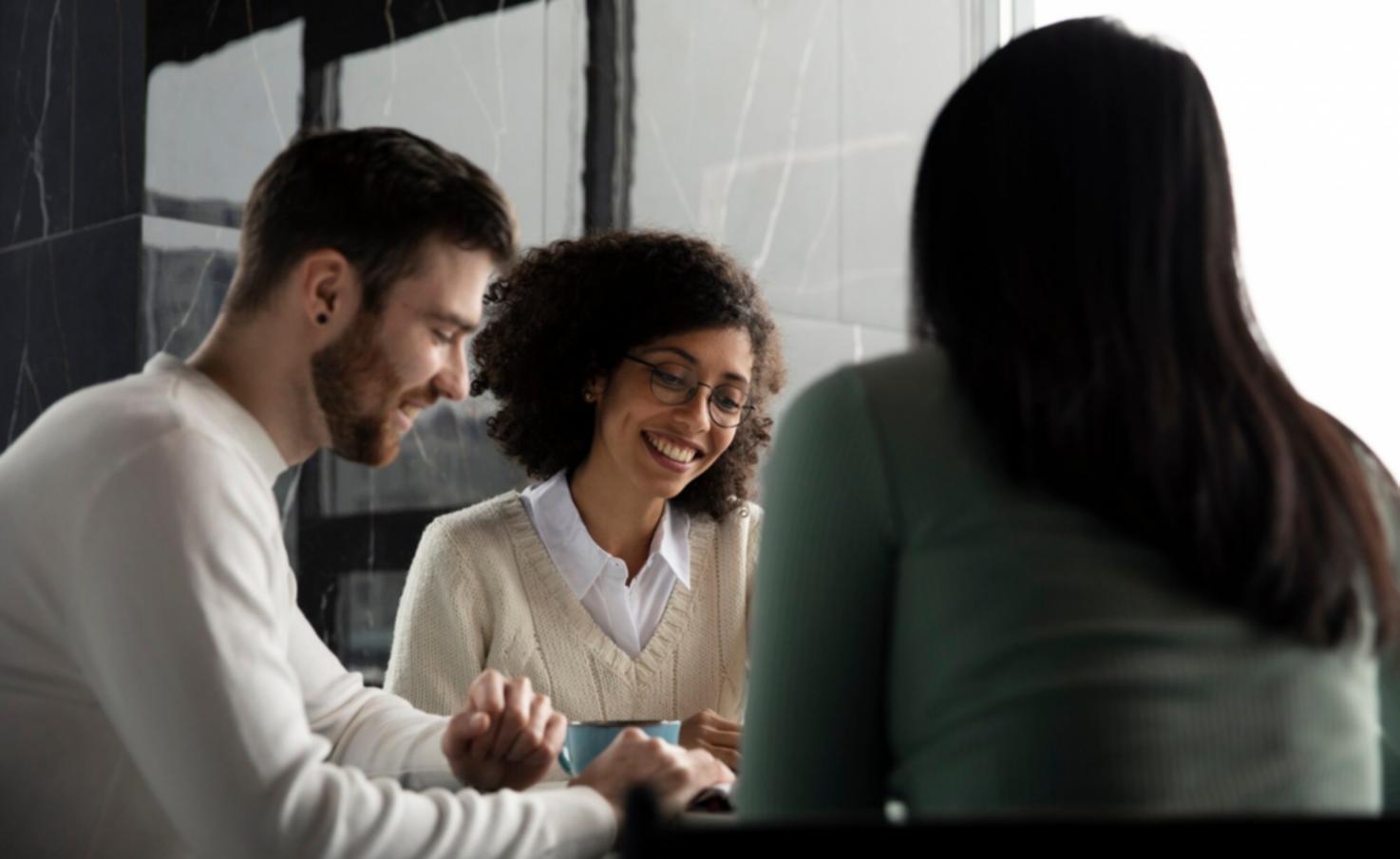 Business professionals collaborating on financial strategy during workshop session